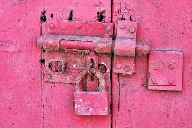 red metal padlock